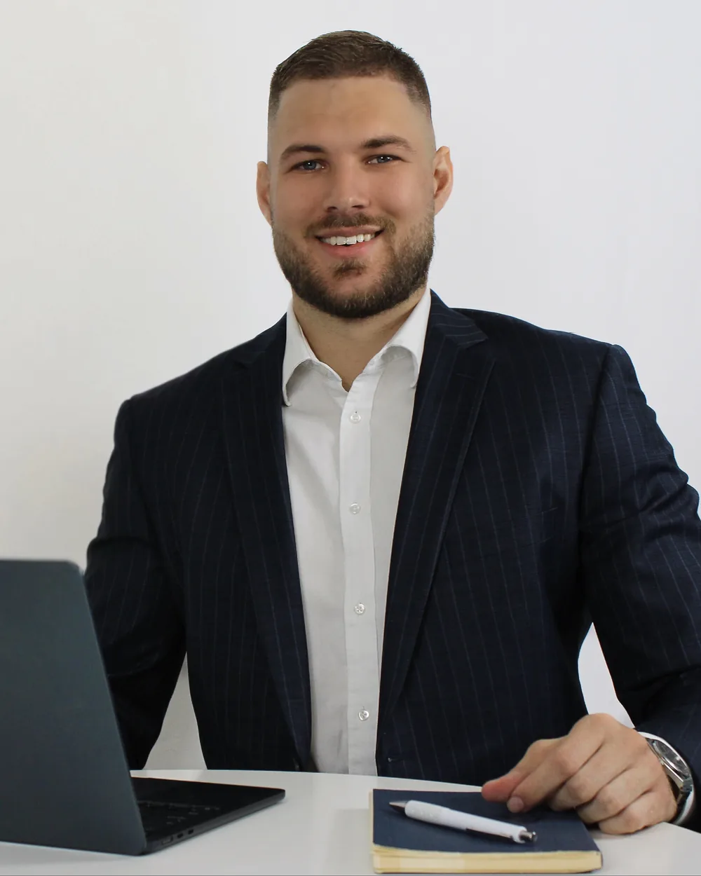 Marko Paunovic, founder and principal mortgage broker at Avala Finance, at his desk.